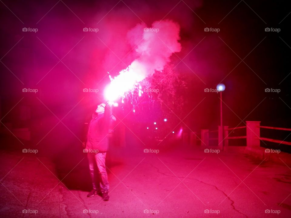 Man holding a firework