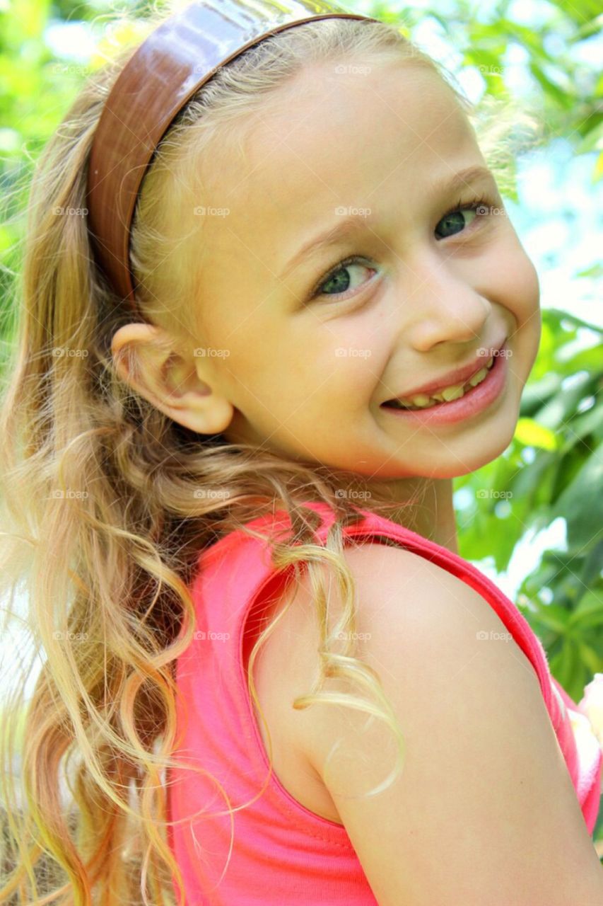 Close-up of a smiling cute girl