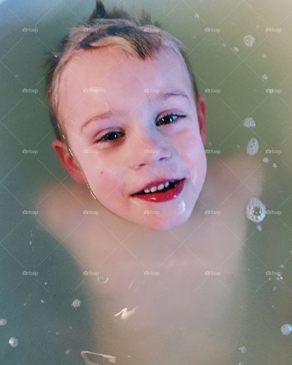 Boy bathing