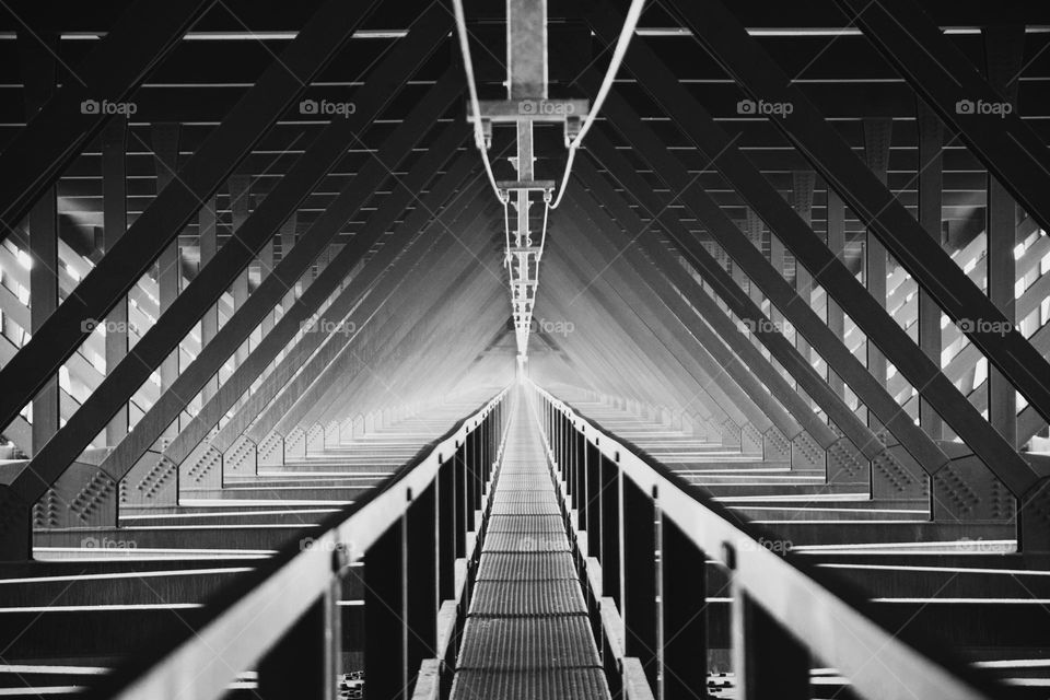 Catwalk under a steel bridge 