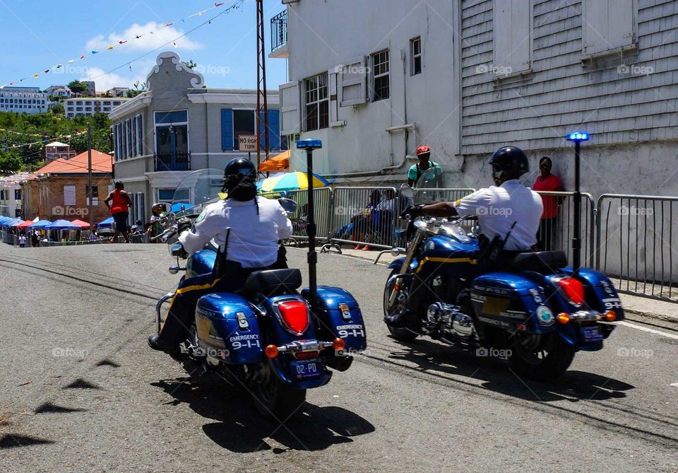 Black police women on motorbike