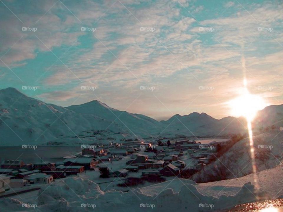 Scenic view of mountain range in snowy weather