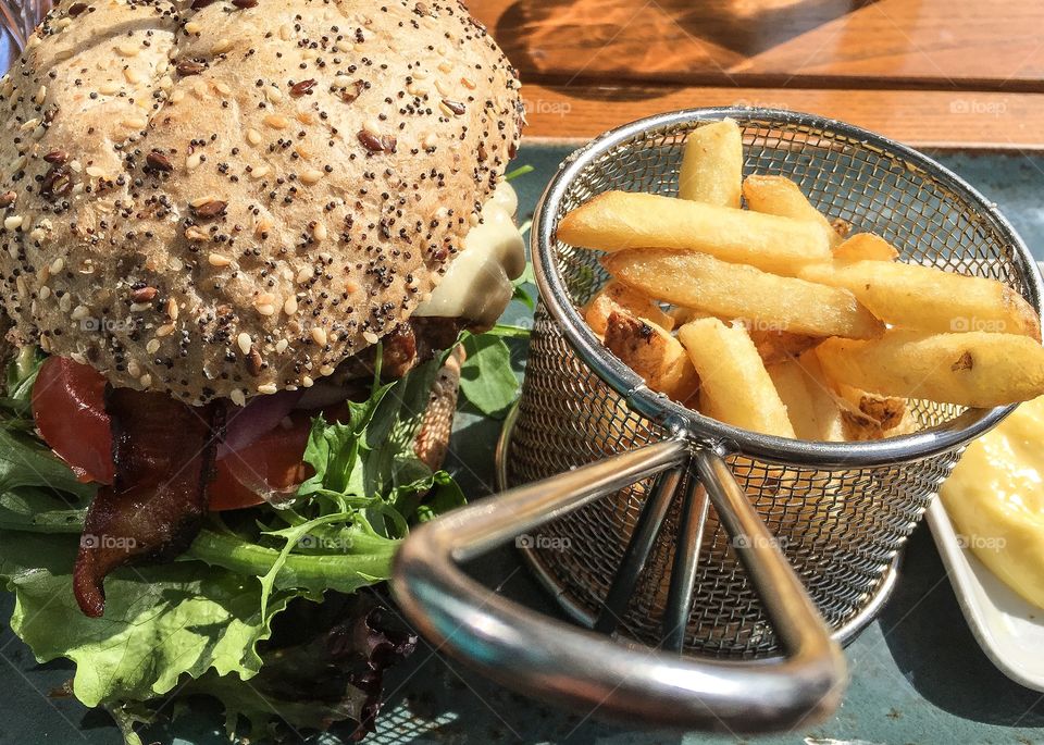 Hamburger meal. Hamburger and Fries in a restaurant