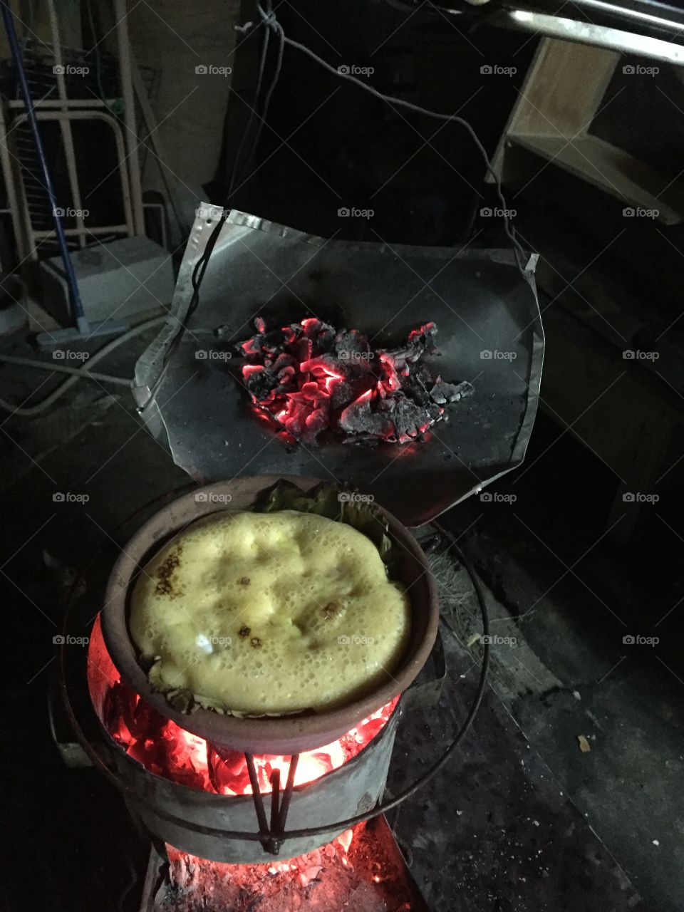Bibingka. We're invited  to cook a  filipino rice cake. The taste  was enhanced by the traditional clay pot and dried coco shell