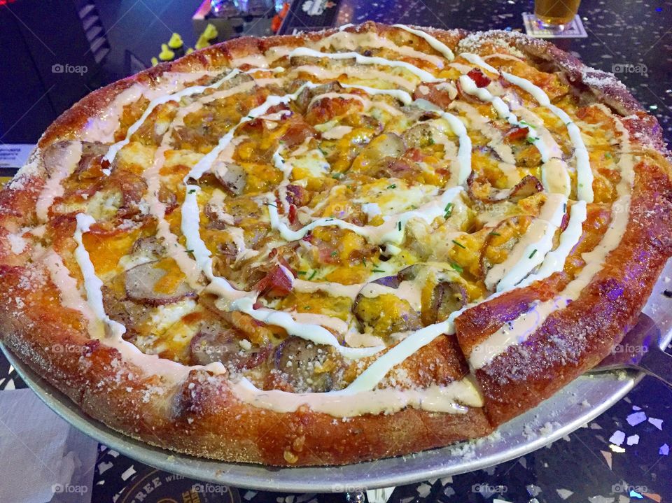 A gourmet  pizza with a combination of ingredients that come together with great flavor