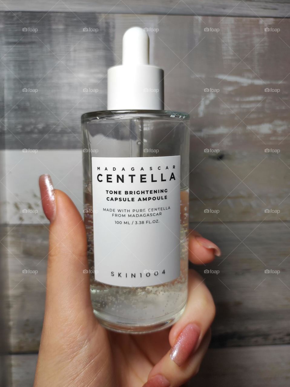 Beauty skincare product in hand/ Product photography /Skincare brands, packaging and serums/ Korean skincare Skin1004 serum with centella