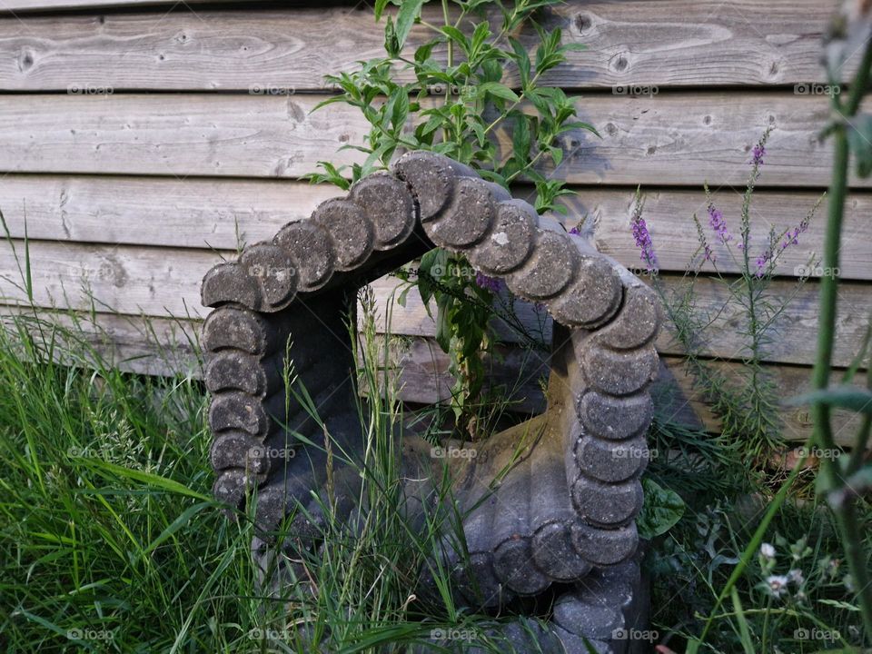 Gray stone stacked decorative flower boxes. Nice for the garden. art picture stone.