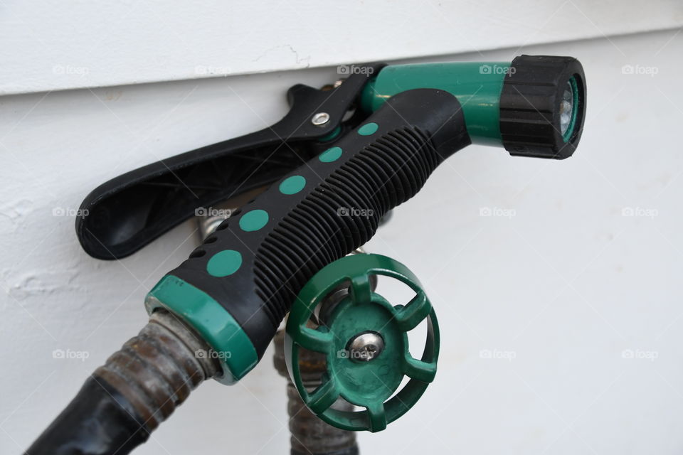 green water hose nozzle and handle