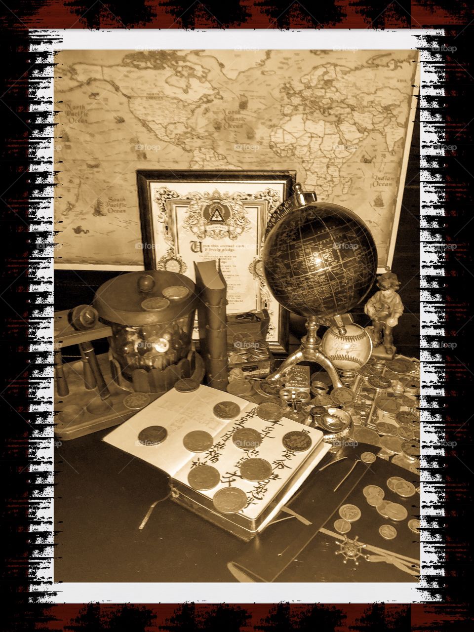 Inspiration struck from my silver dollar and old world ways so here is my grandfather’s tobacco station and pipe with old world maps and coins. Not all American without a timeless autographed baseball, nautical books and the language development. 