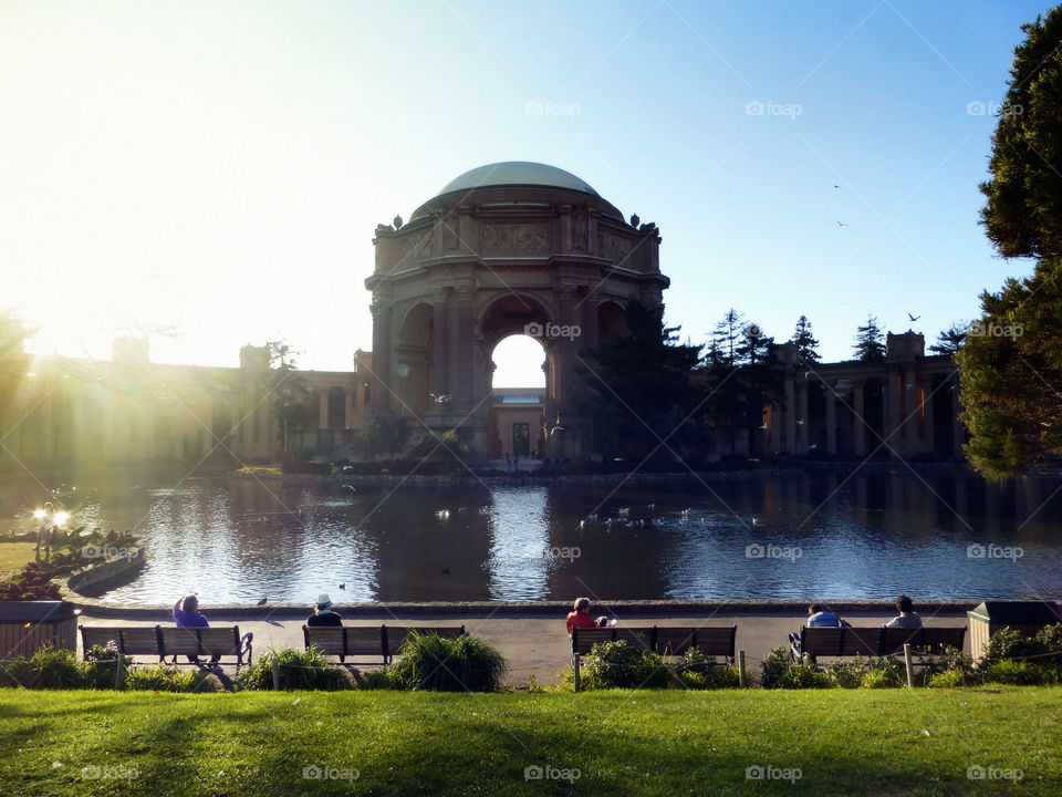 interesting photo story, there's one person sitting on each bench relaxing, some are talking at the park