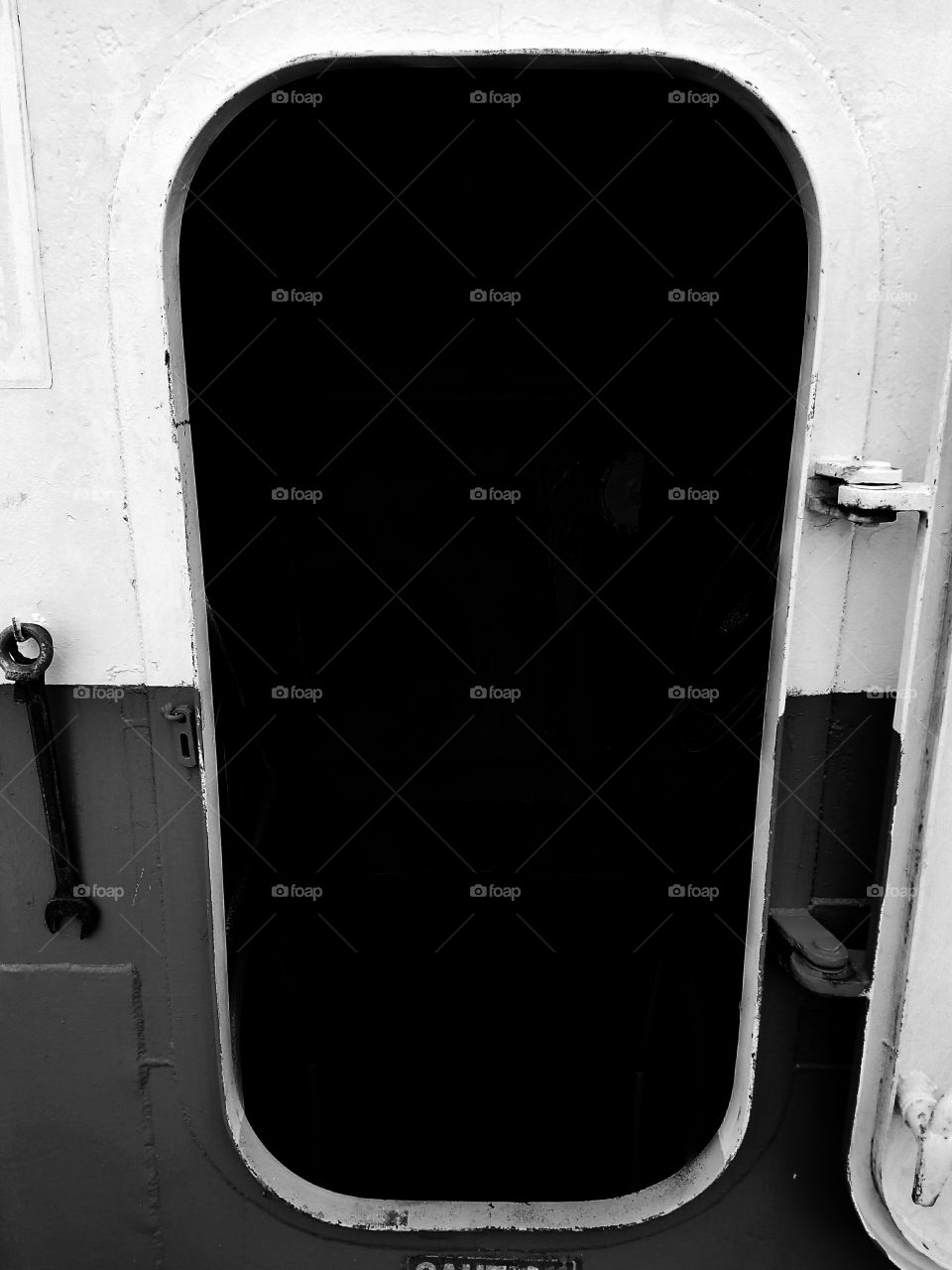 Hull access door in black and white