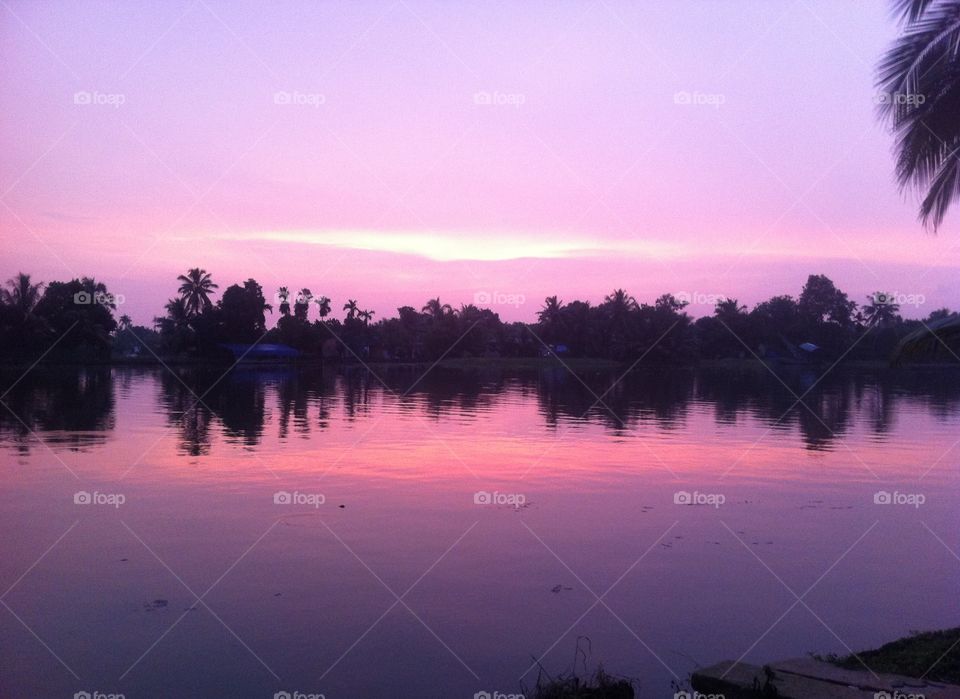 sunset in the backwaters in Kerala