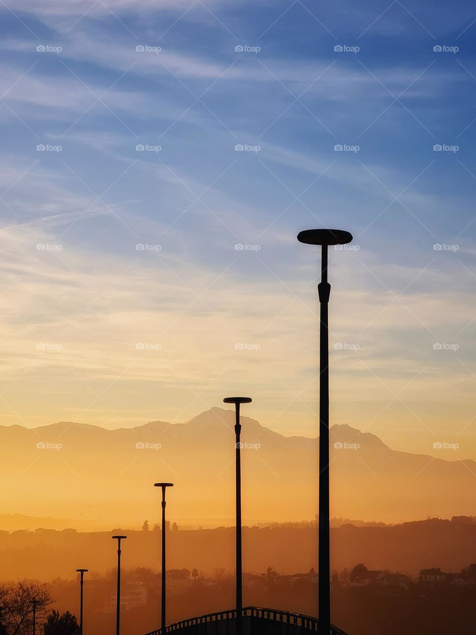 solar powered street lights lined up in a row