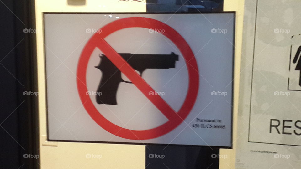 No guns allowed sign.