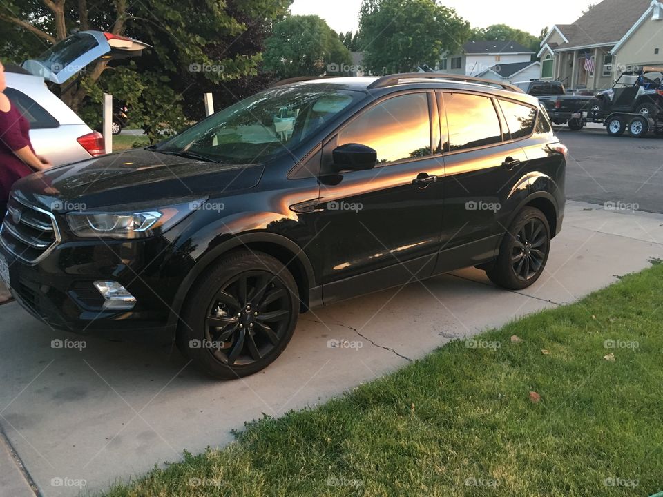 Sunset reflection on vehicle 