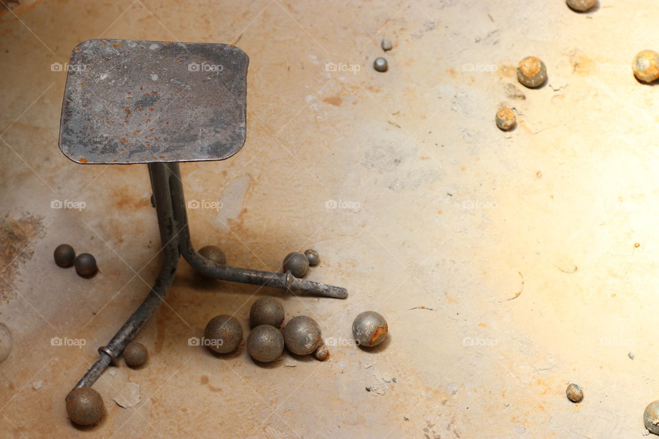 Iron balls and chair