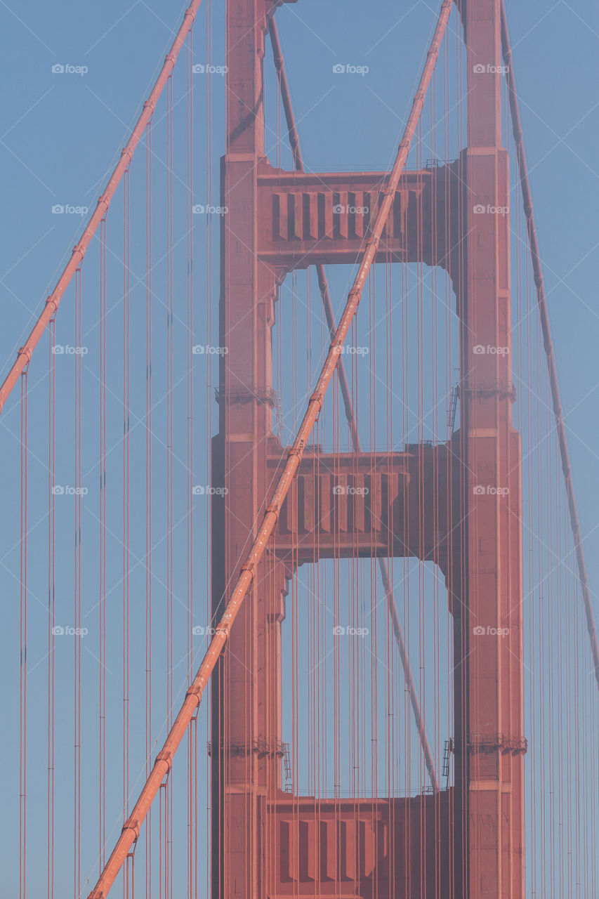 Vertical orientation of the Golden Gate bridge close up