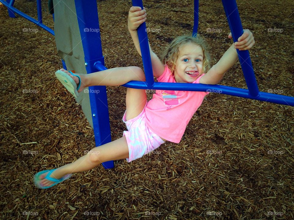 Girl playing in playground