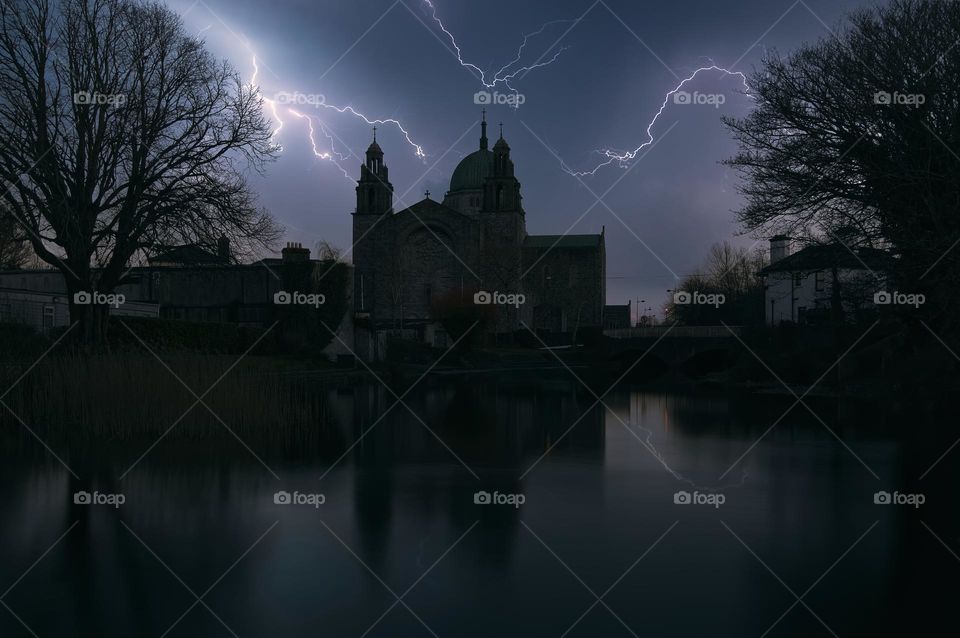 Night scene with thunderstorm over Galway cathedral in Ireland