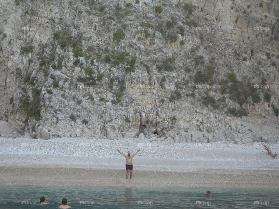 First swimmer on the beach