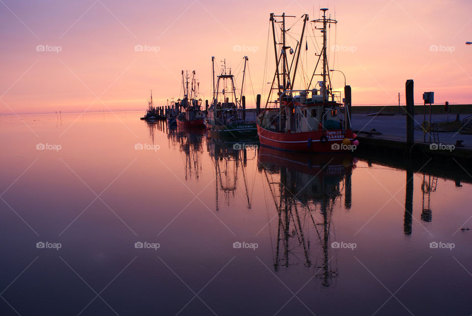 sunrise sea old harbor by corneliam
