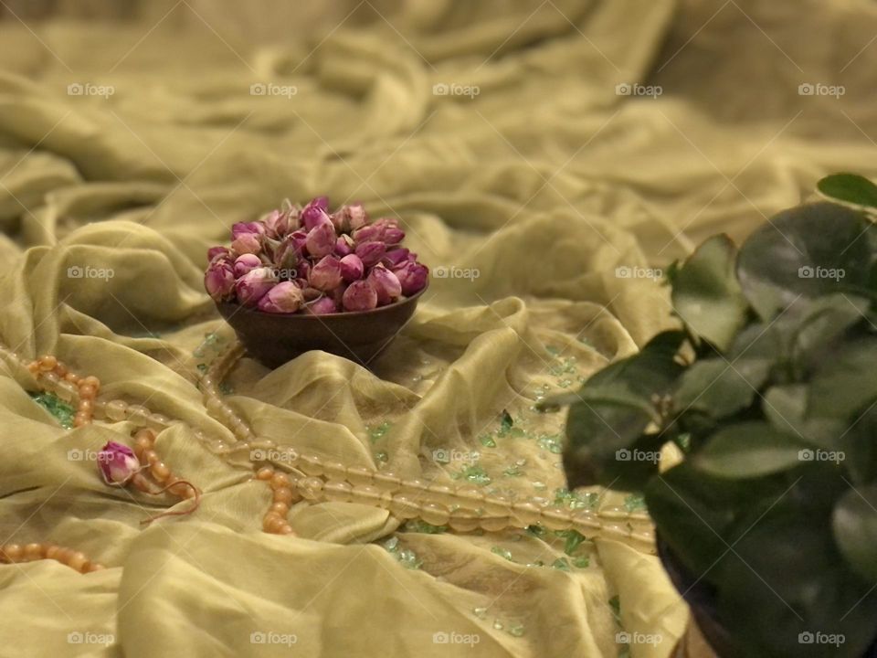 We were all fast sleep, and no one heard angels' footsteps when they brought us Damask roses.