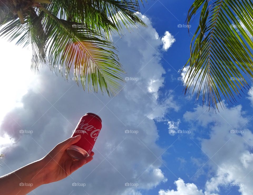 Coca Cola in hand