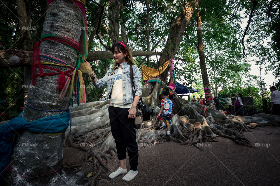 Girl with big banyan tree