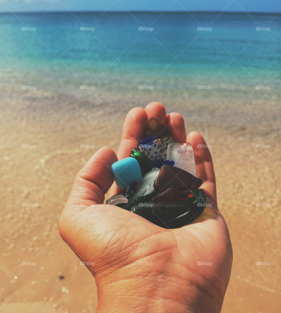 Hand Holding Sea Glass In Front Of The Ocean, Colorful Sea Glass, Summertime By The Sea, Outstretched Hand Holding Sea Glass, Sea Glass, Colorful Beach Scene 