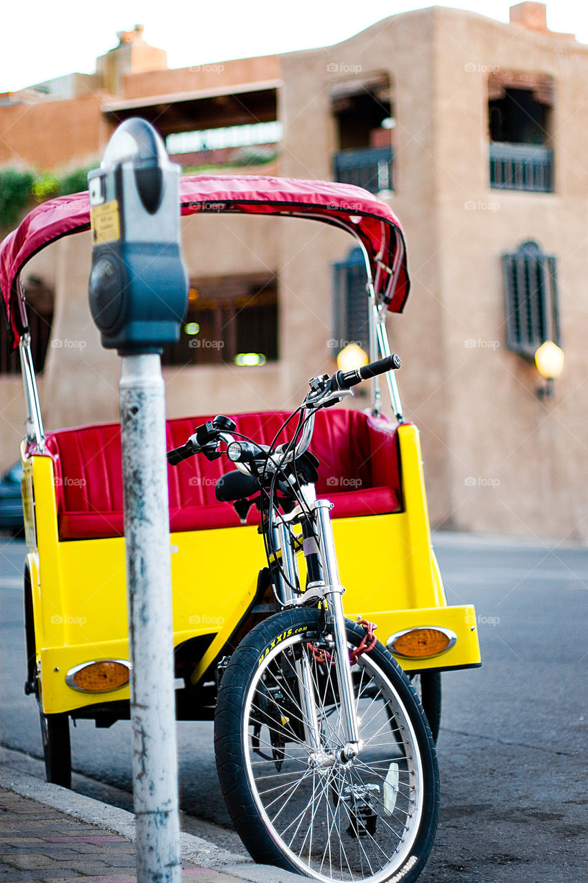 Yellow colored rickshaw 