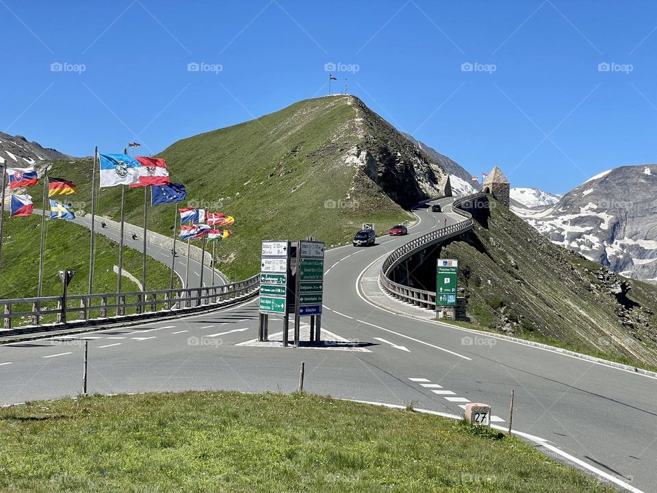 Road trip on Großglockner high alpine road  in the alps of Austria on a sunny summer day, view of mountains and road