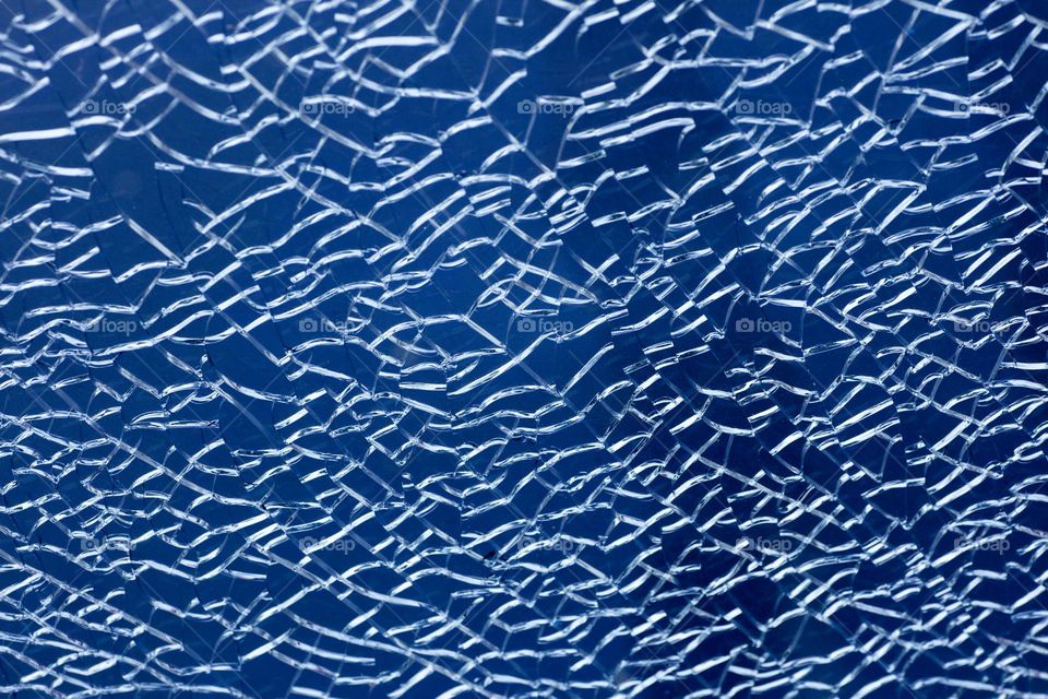 Blue cracked window glass damage situation be careful abstract background