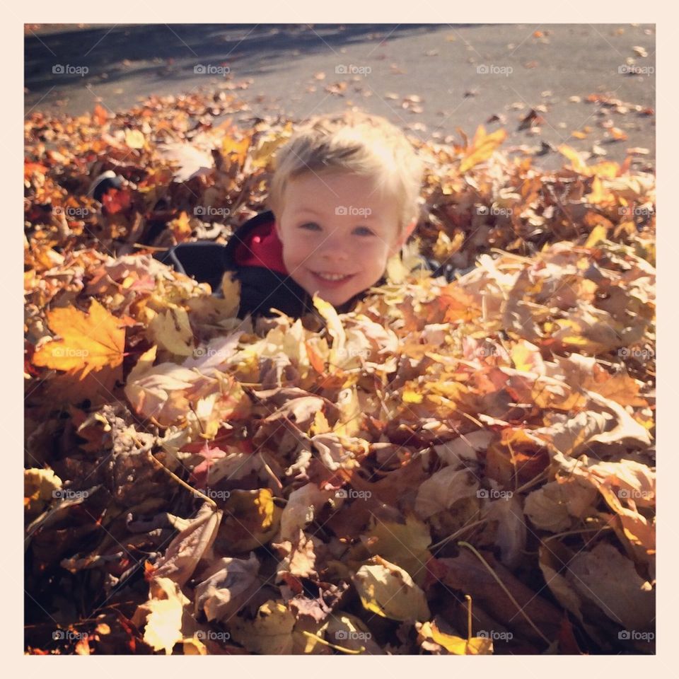 Playing in leaves