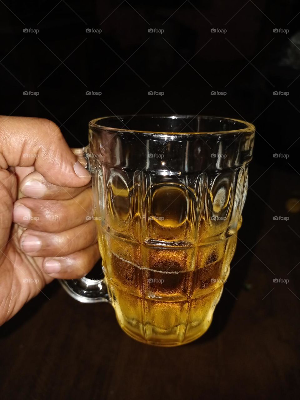 Young man holding beer mug enjoying weekend with child beer better life with beer no tension life is a beautiful journey so don't worry be Happy