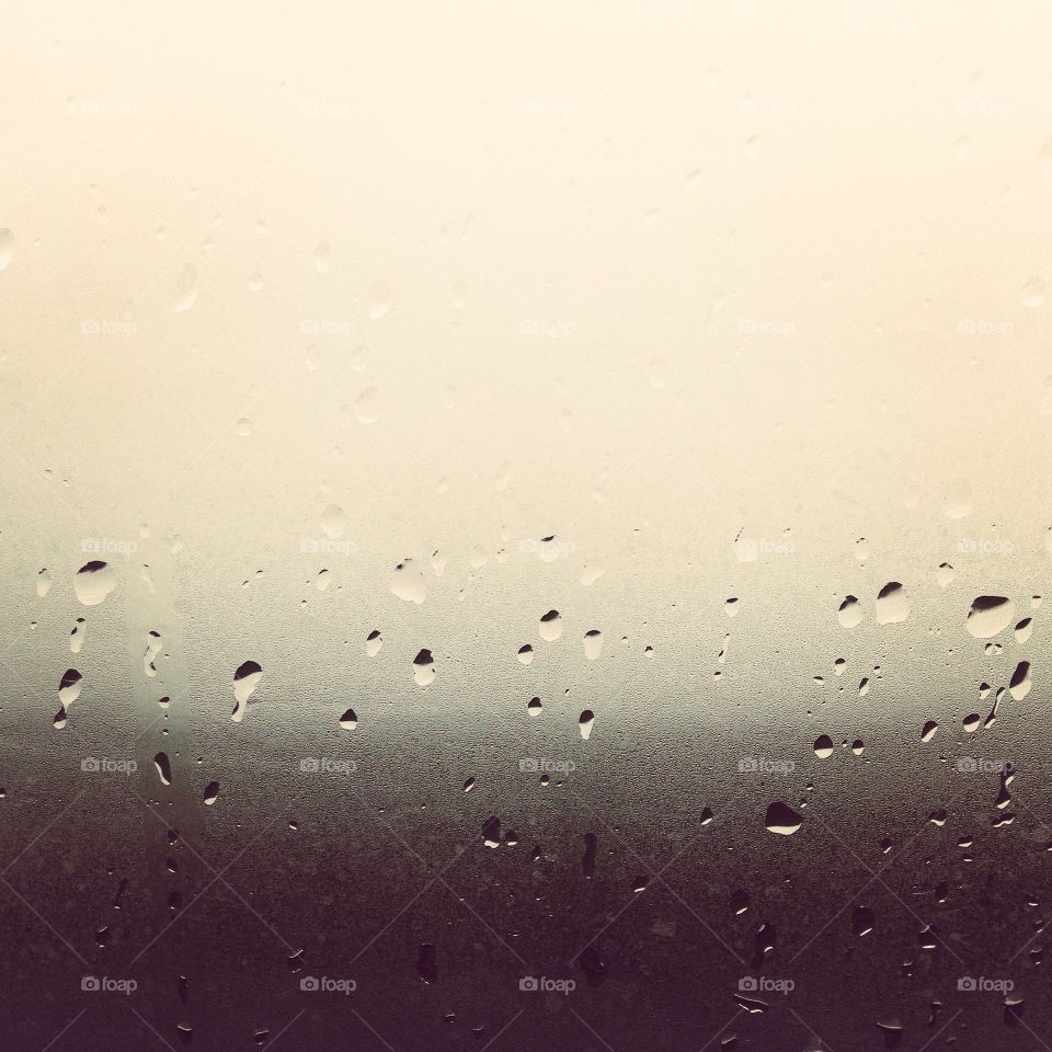 Close-up of rain drops on window