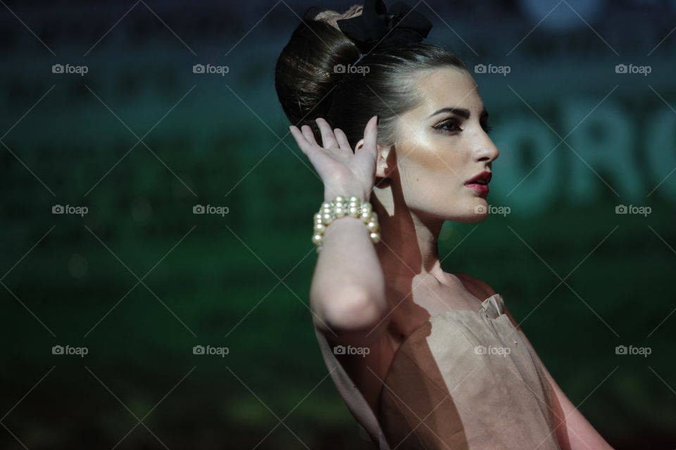 Close up of model face on walkway