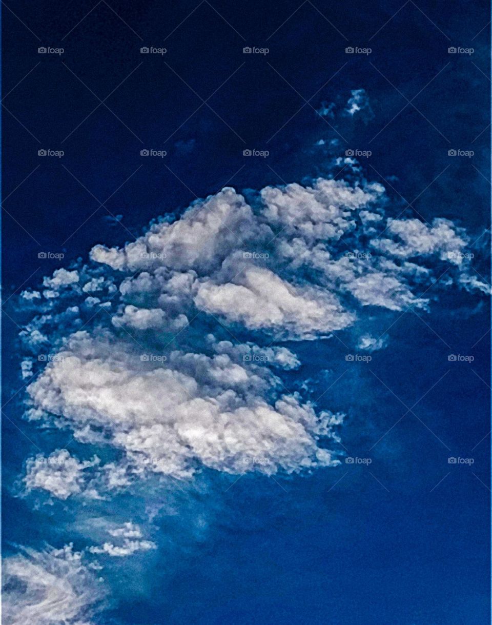 I want to show white clouds and blue sky in this photo.  The sky looks very beautiful with clouds and blue sky.