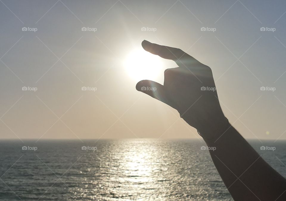 holding the sun
