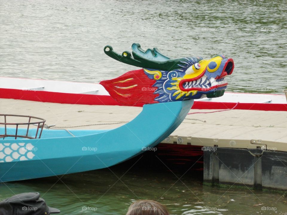 Colorful dragon boat at Dragon Boat Festival at Sloan 's Lake in northwest Denver.