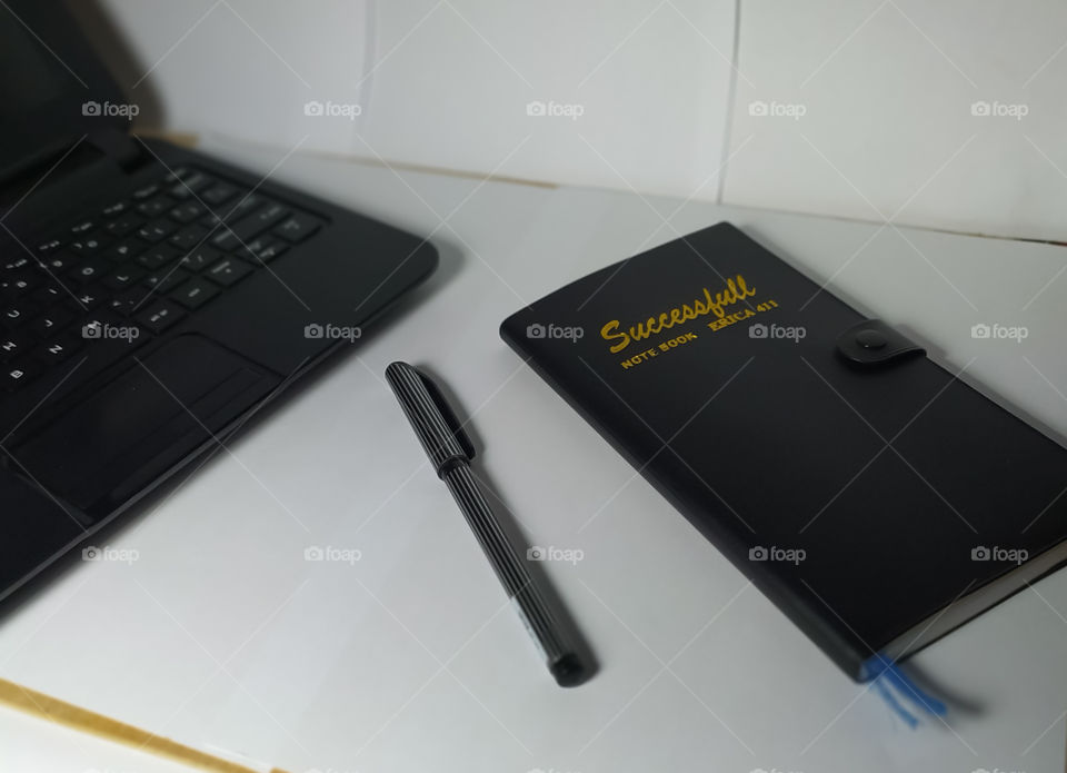 black journal book with white background