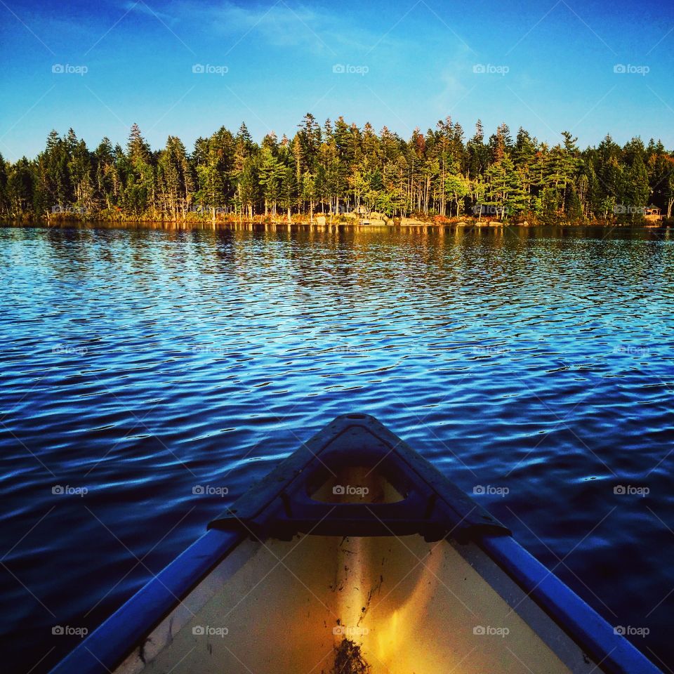 Canoe on the lake. Evening canoe trip on the lake. Nova Scotia, Canada.
