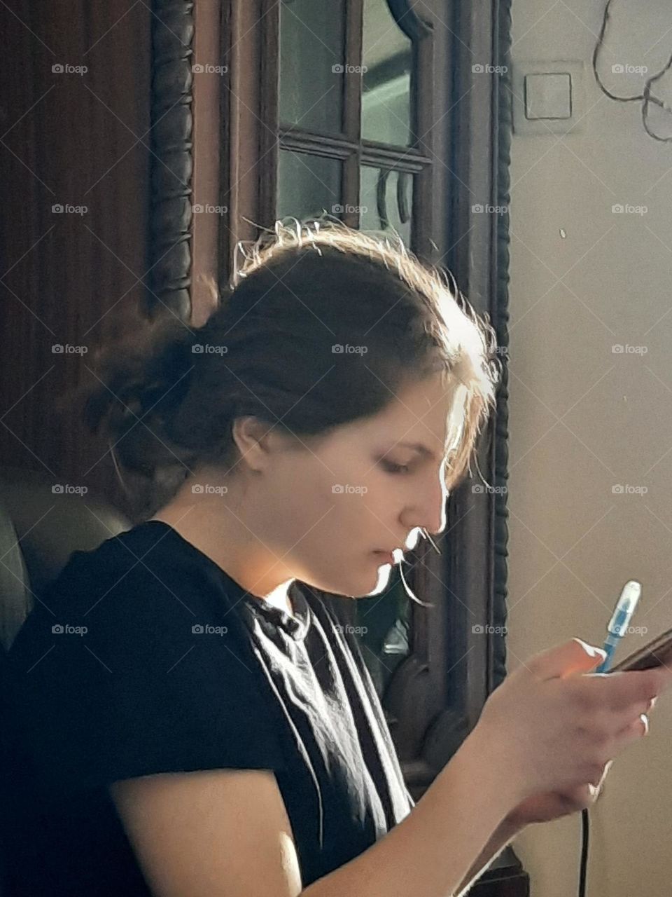 young woman reading SMS