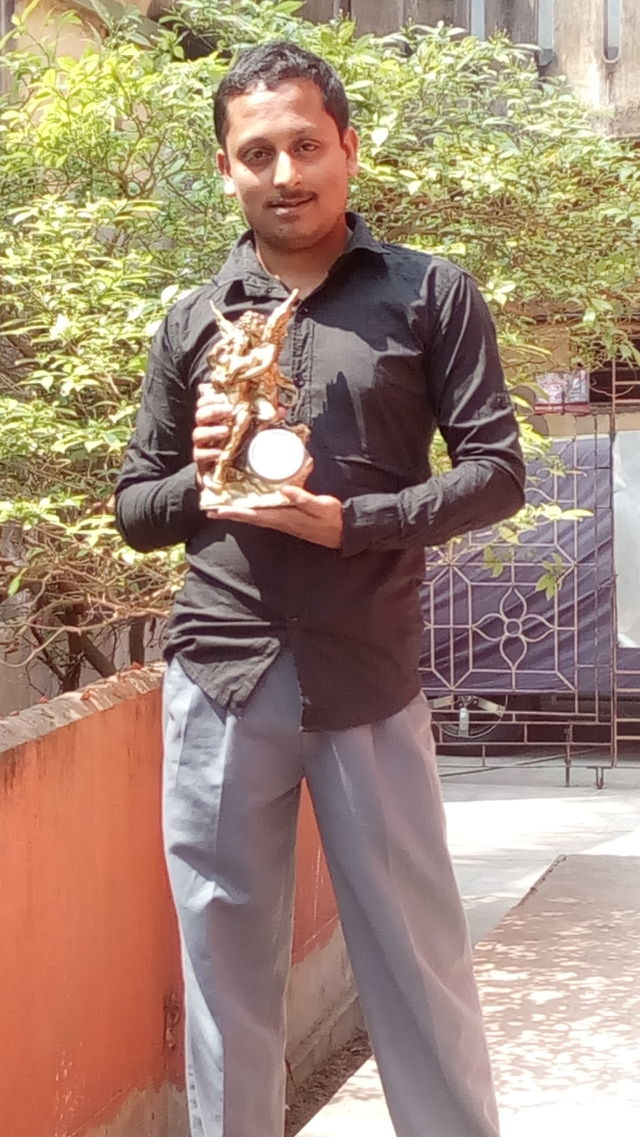 man with statue