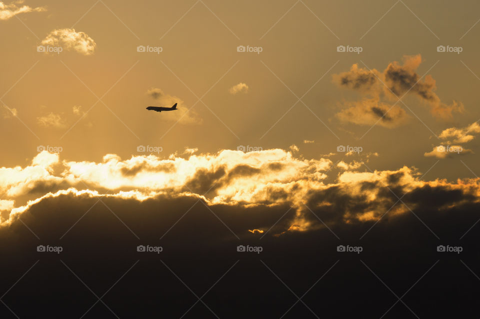 Airplane in a cloudy sky