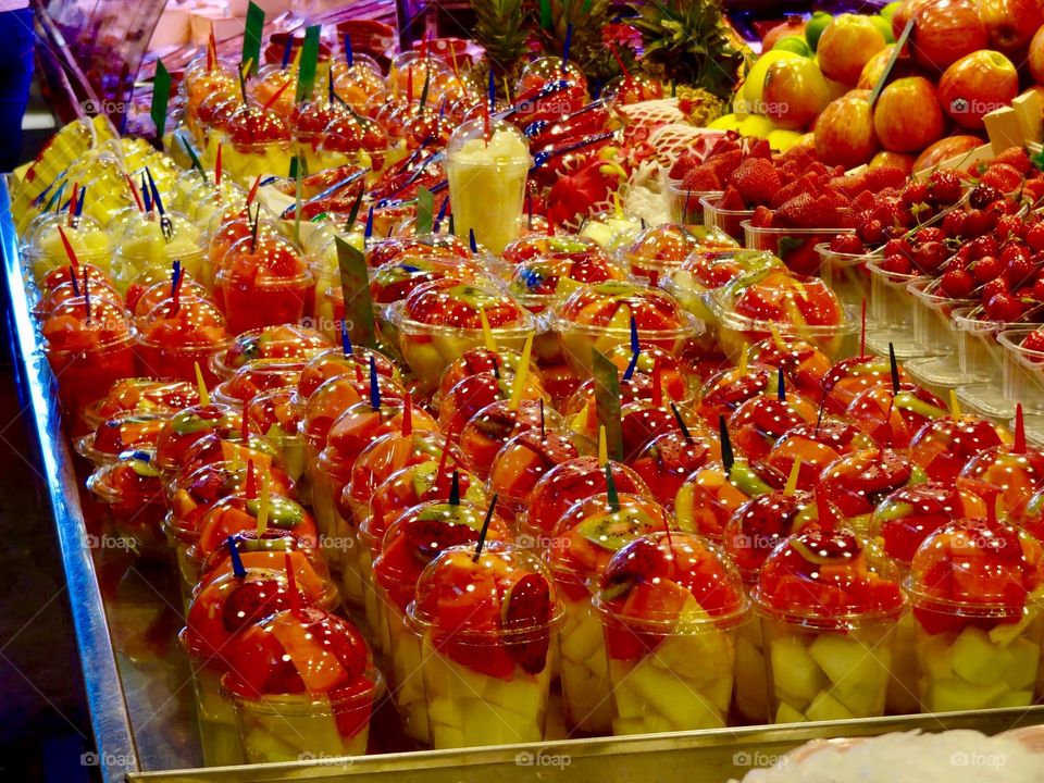 Aligned fruits salads, Barcelona, Spain