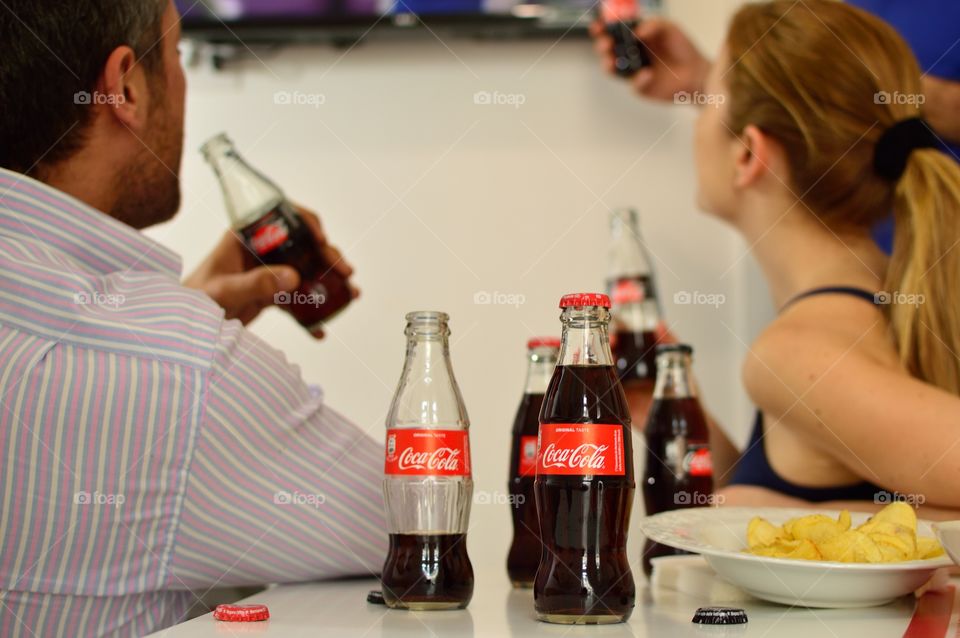 friends who drink Coca-Cola