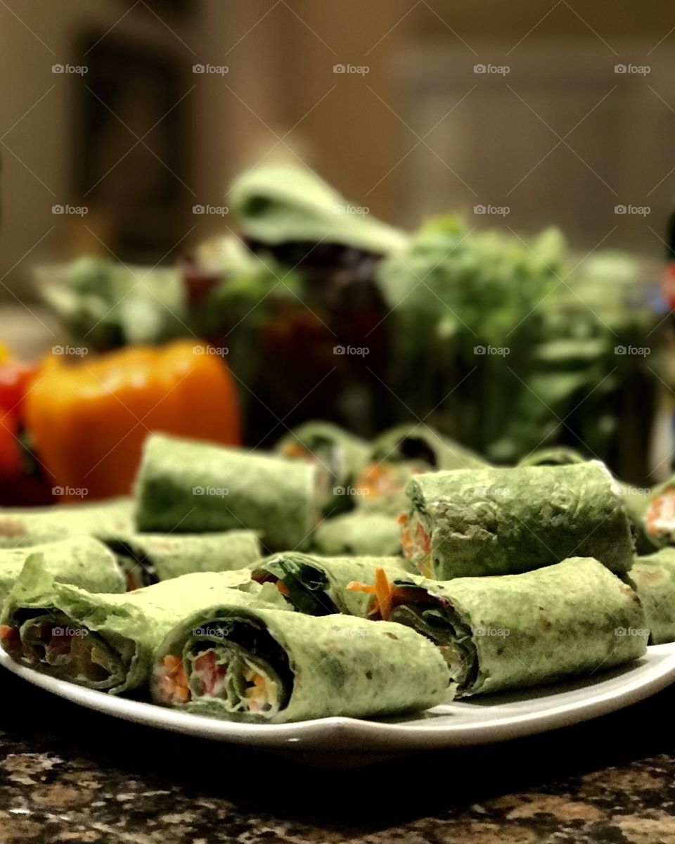 Fresh green spinach and veggie wraps 