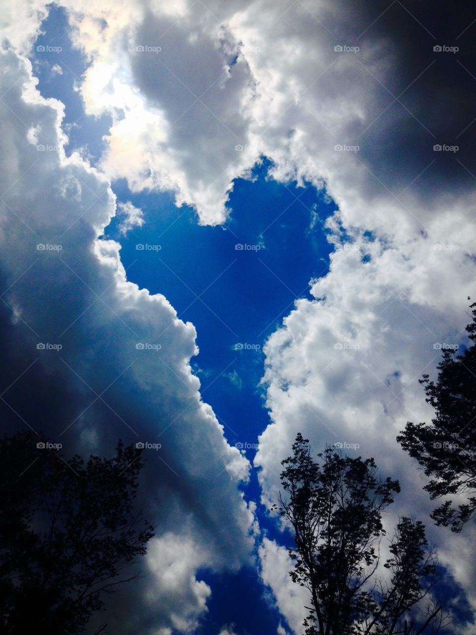 Heart. Heart of Clouds. Sitting in the mountains discussing a friends recent loss of her mom. Looked up and there was a heart.