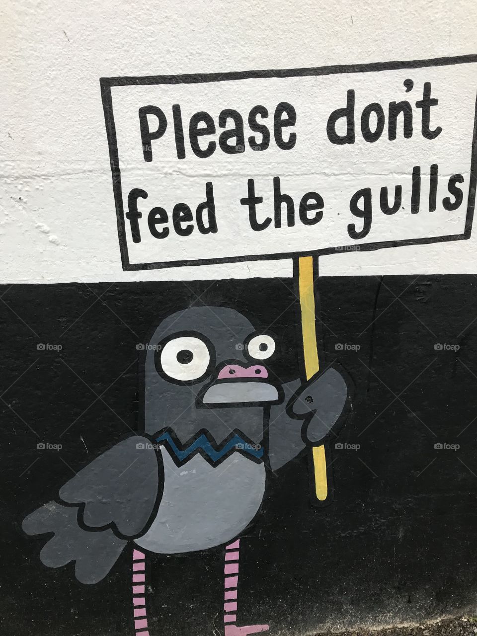 Gulls  not wanted, this message gets the point across.