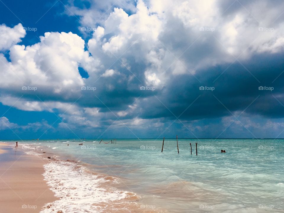 On these summer days, I like to sit by the beach and admire the infinite sea. Here: Bruna's Beach, in Alagoas (Brazil). / Nestes dias de verão, gosto de sentar na praia e admirar o infinito do mar. Aqui: Praia da Bruna, em Alagoas (Brasil).